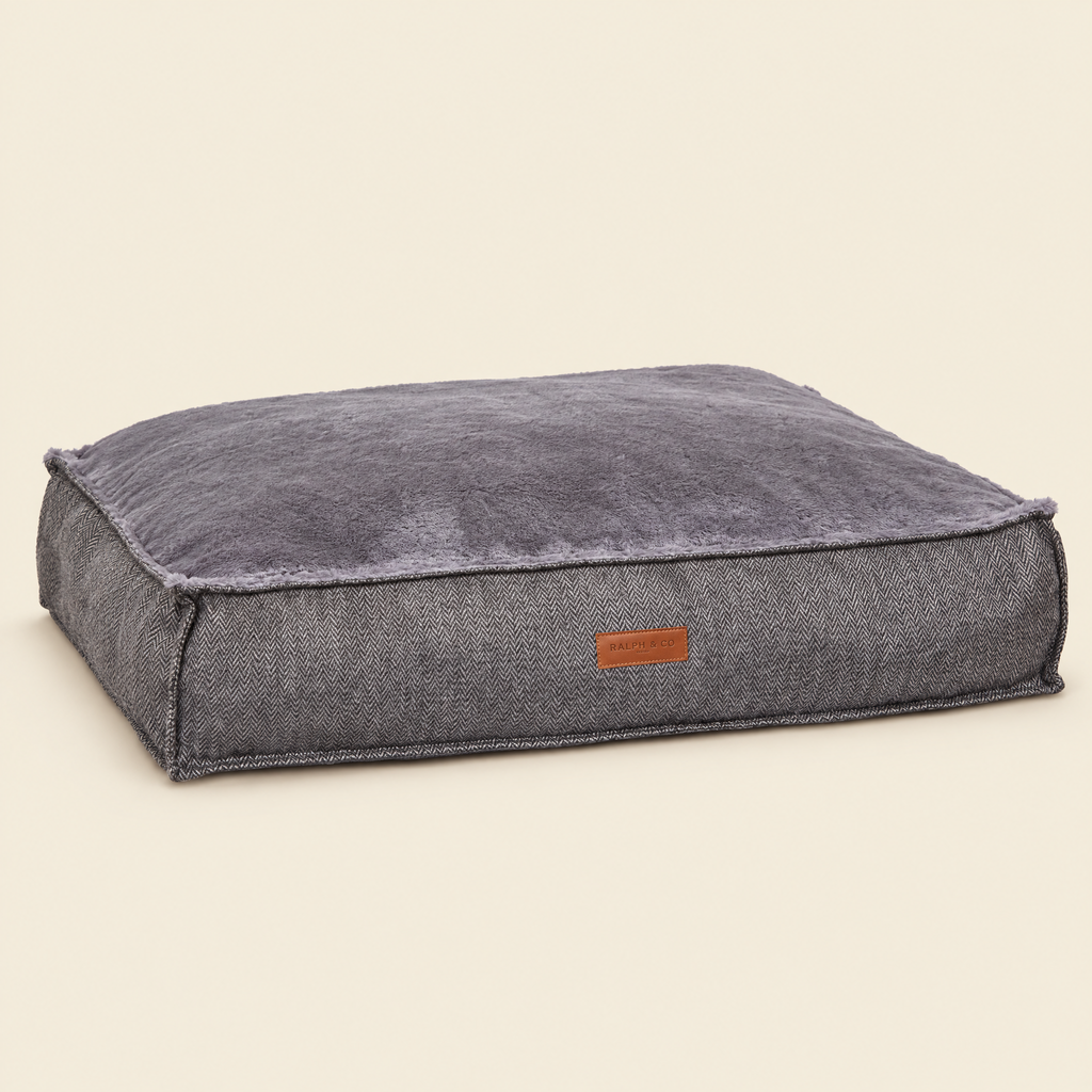 The Balmoral Herringbone Flat Pillow Bed by Ralph & Co, packshot on cream