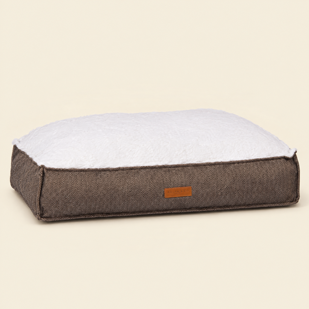 The Lincoln Tweed Flat Pillow Bed by Ralph & Co, packshot on cream