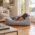German Shorthaired Pointer in The Kensington Houndstooth Bolster Bed by Ralph & Co in a Richmond riverside sitting room