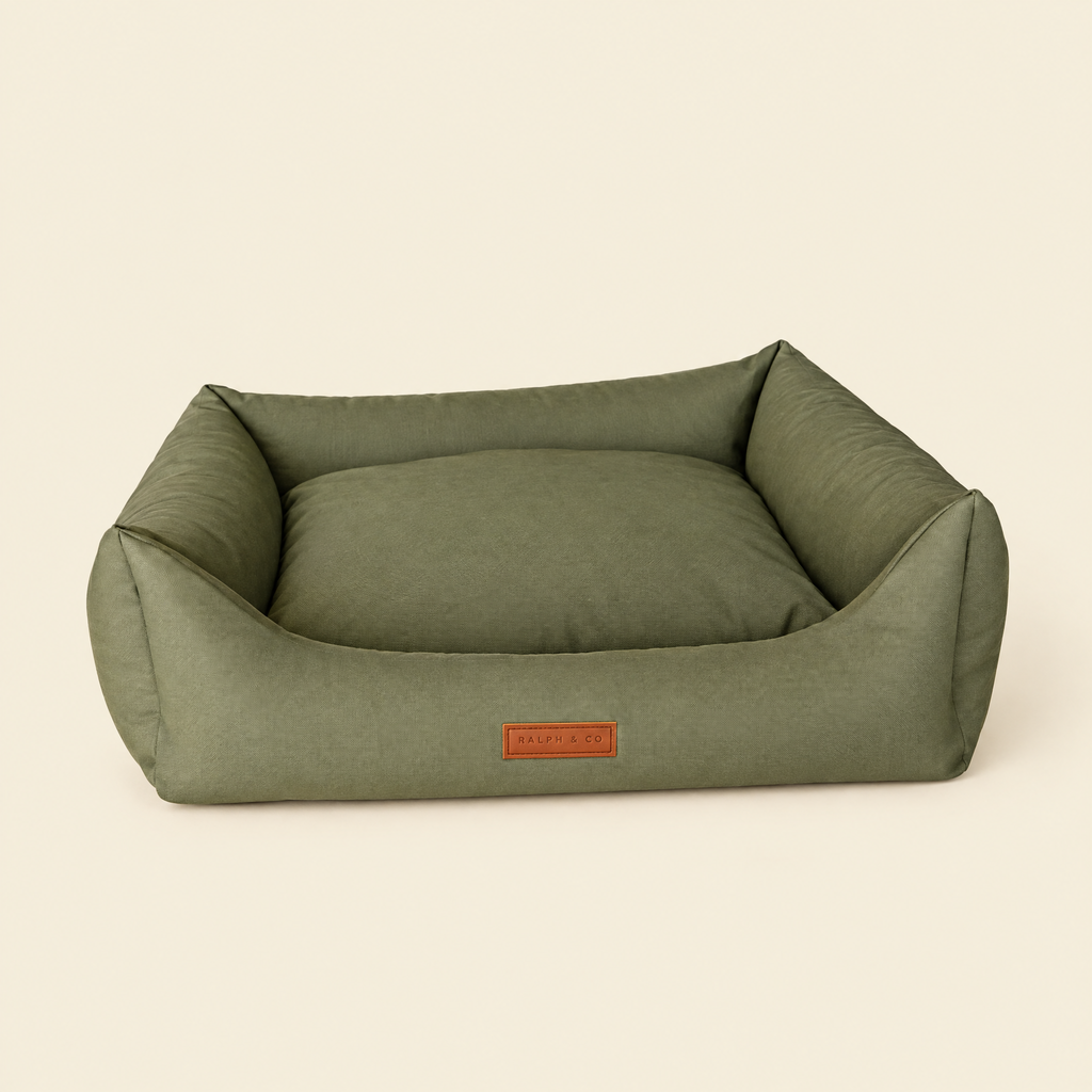 The Henley orthopaedic waterproof bolster bed by Ralph & Co on a cream background