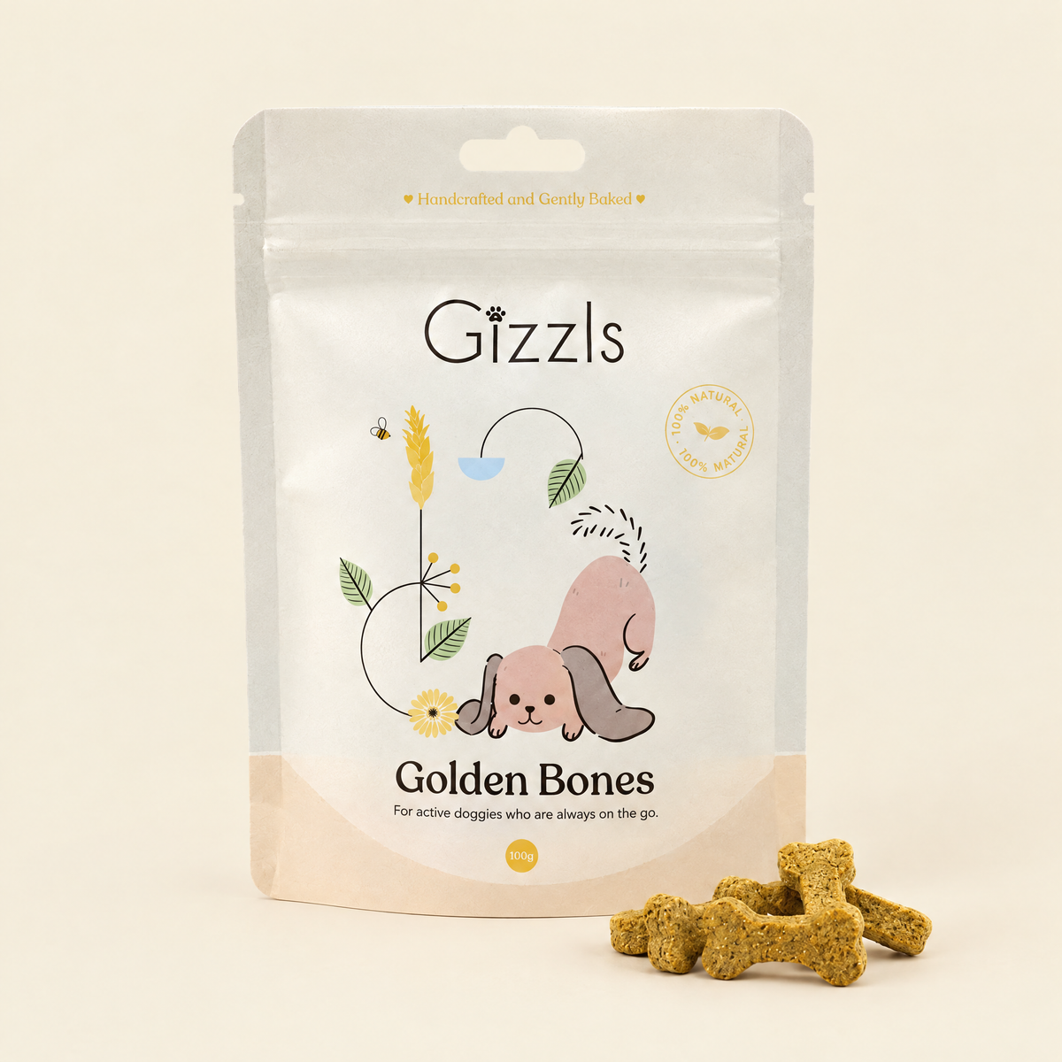 Pack of Golden Bones Small Dog Treats by Gizzls with bone-shaped treats on a cream background