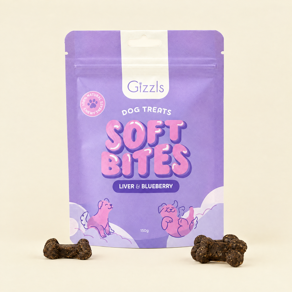 Gizzls Soft Bites Ostrich Liver & Blueberry 150g pack with treats on cream