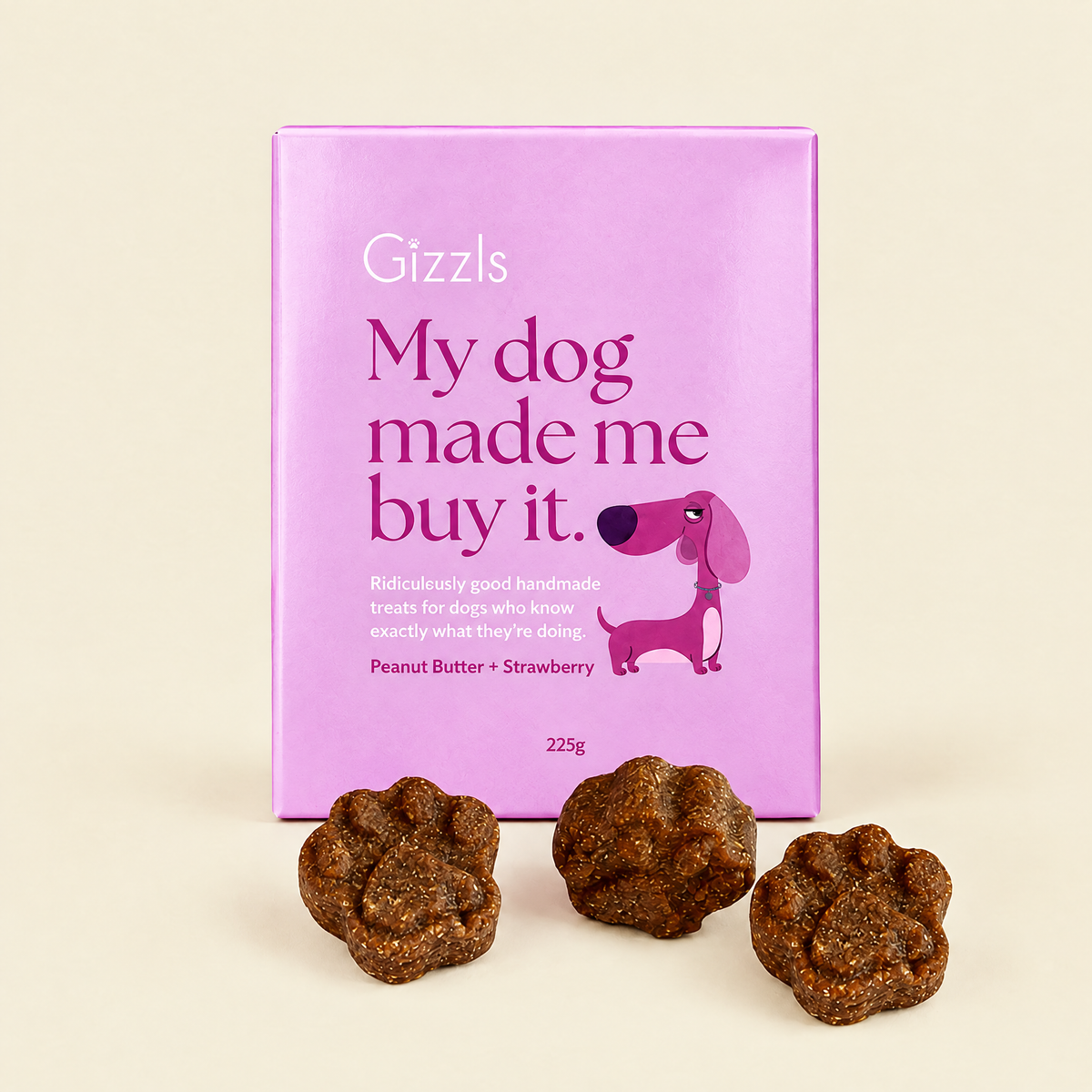 Gizzls My Dog Made Me Buy It Peanut Butter & Strawberry pack with treats on cream