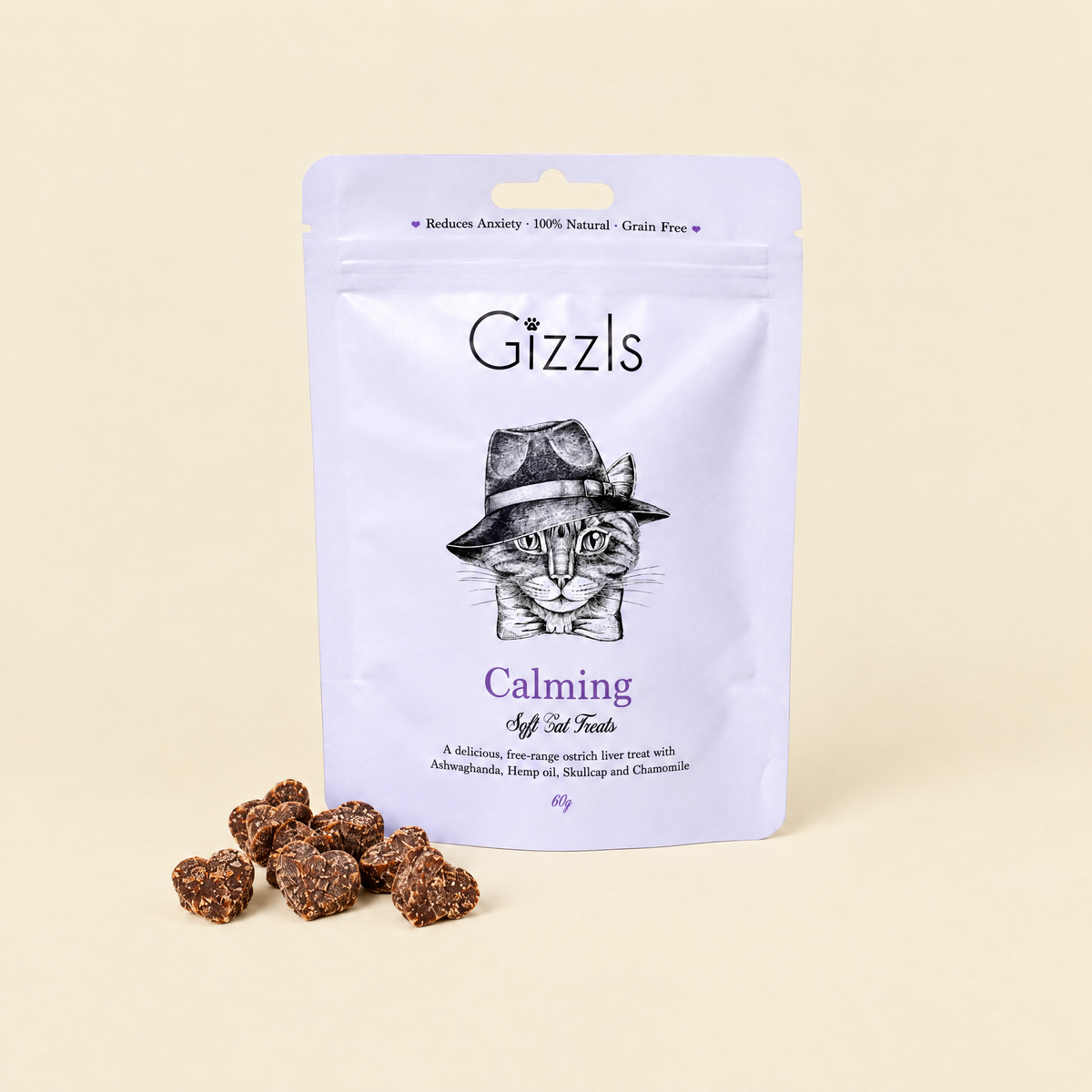 Gizzls Calming Soft Cat Treats pack with treats on cream