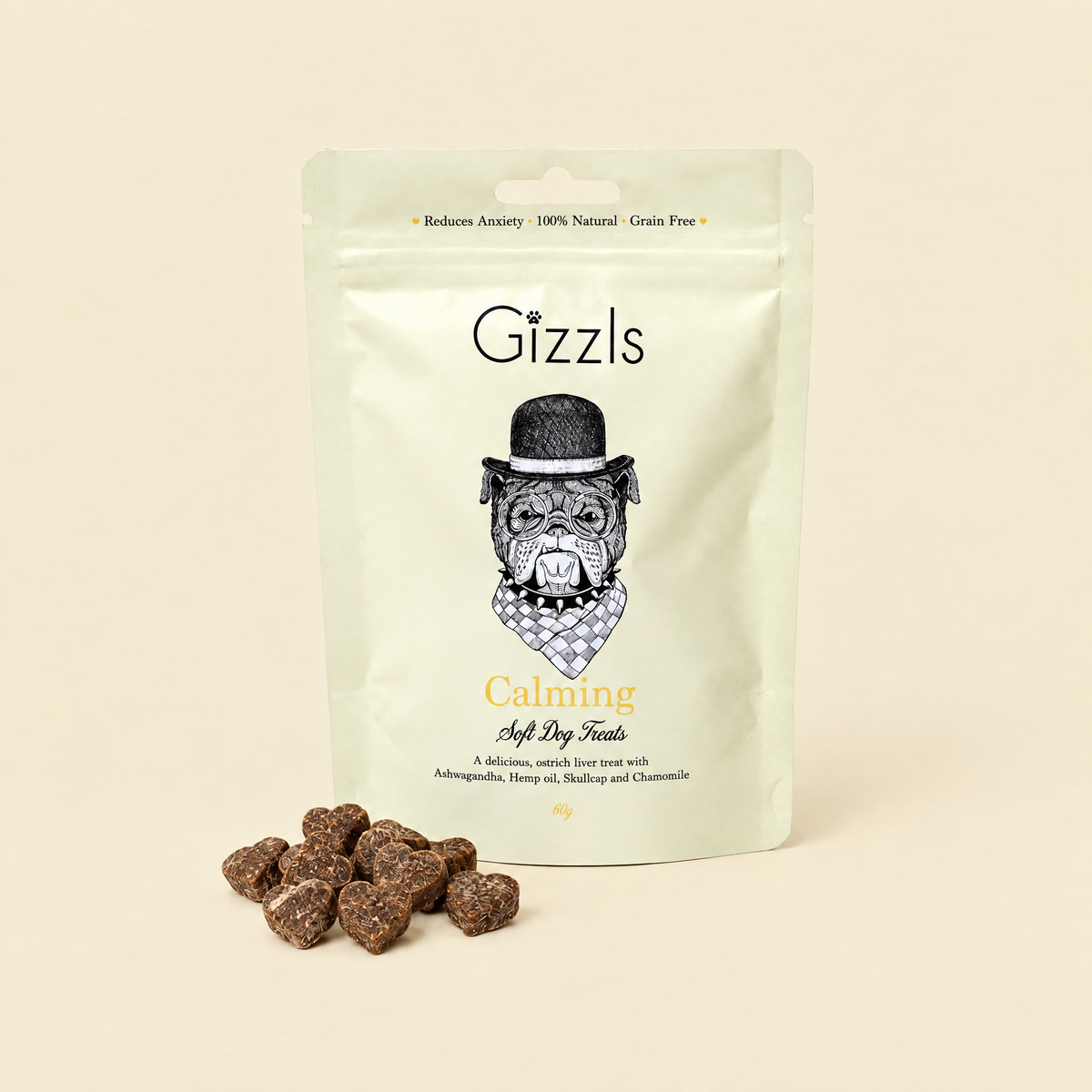 Gizzls Calming Soft Dog Treats pack with treats on cream