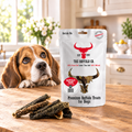 Beagle gazing at a pack of Buffalo Tripe Dog Treats by The Buffalo Co.