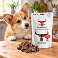 Corgi gazing at a pack of Buffalo Lung Steaks by The Buffalo Co.