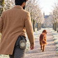Foxbury Plaid poo bag holder clipped to a belt on a dog walk