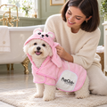 Puppy being dried in the Pink teddy bear drying robe by PupClub Couture