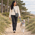Dog walker wearing the Grey mini dog walking bag by PupClub Couture